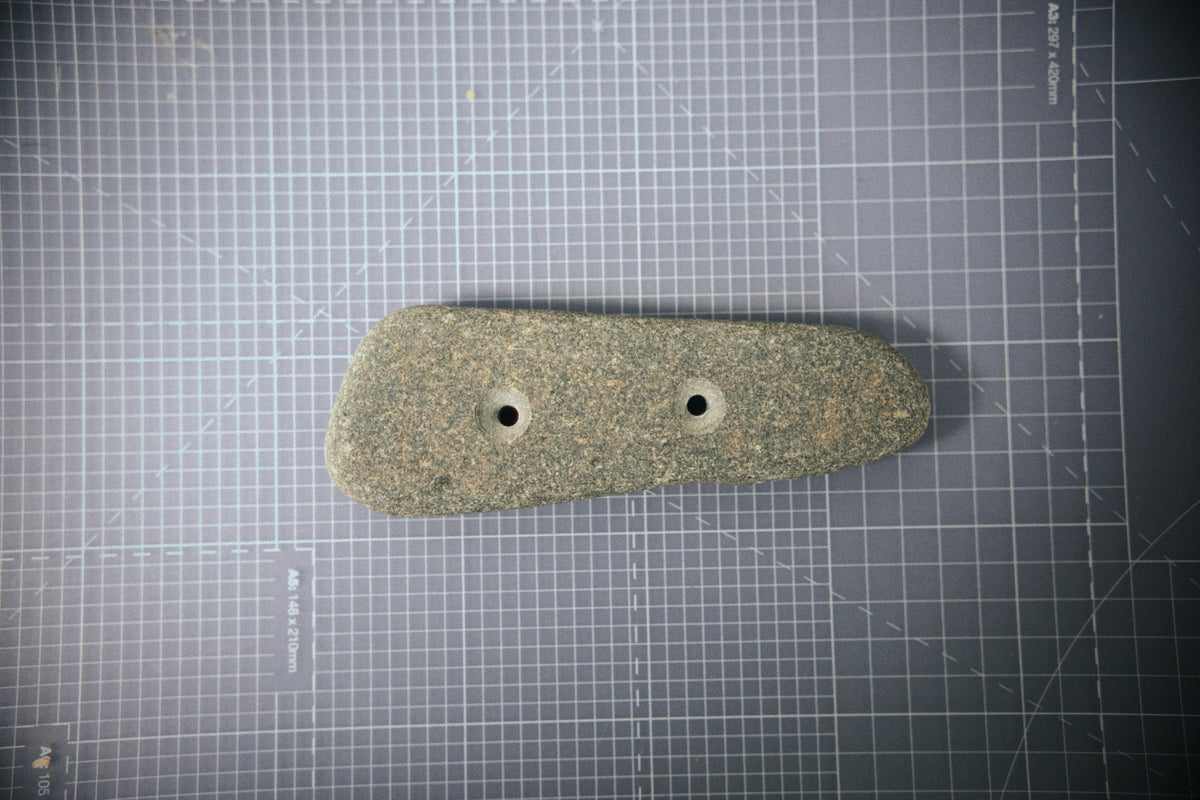 Medium pinch climbing hold made from a natural coastal stone (STO061)