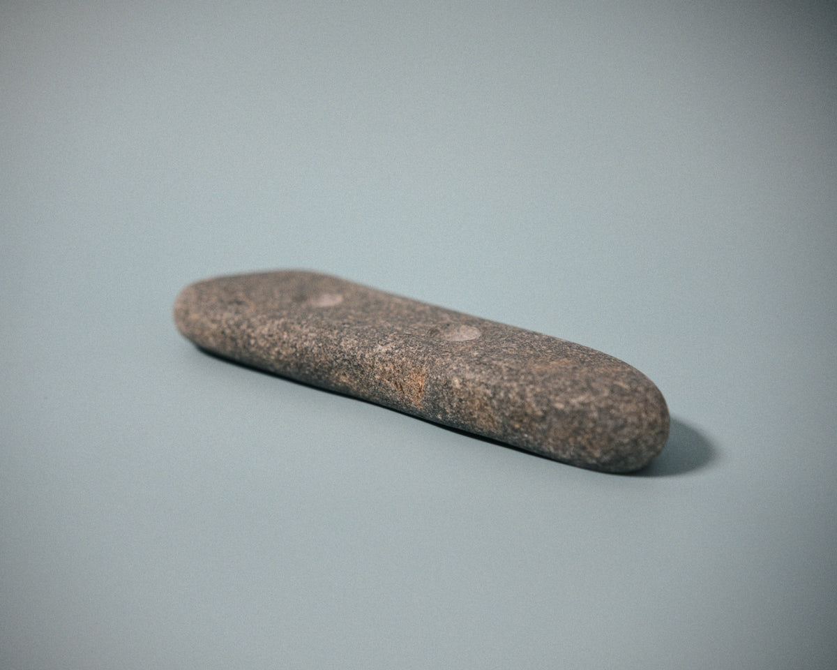 Medium pinch climbing hold made from a natural coastal stone (STO061)
