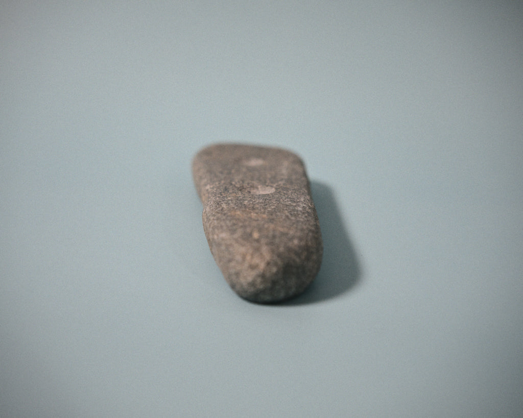 Medium pinch climbing hold made from a natural coastal stone (STO061)