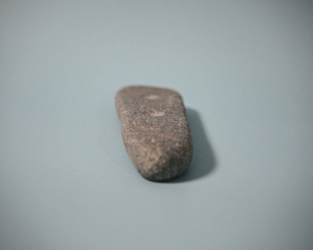 Medium pinch climbing hold made from a natural coastal stone (STO061)