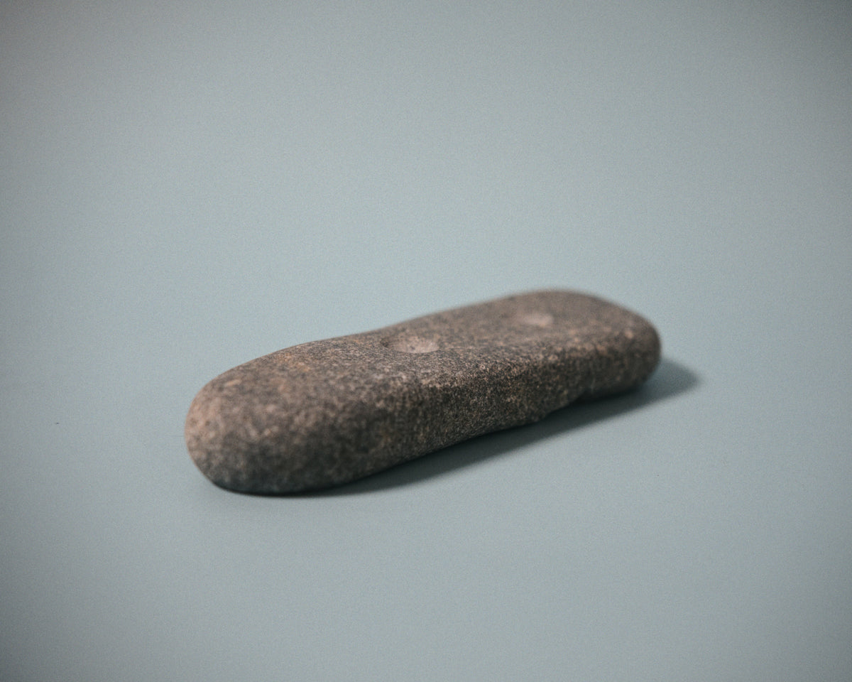 Medium pinch climbing hold made from a natural coastal stone (STO061)