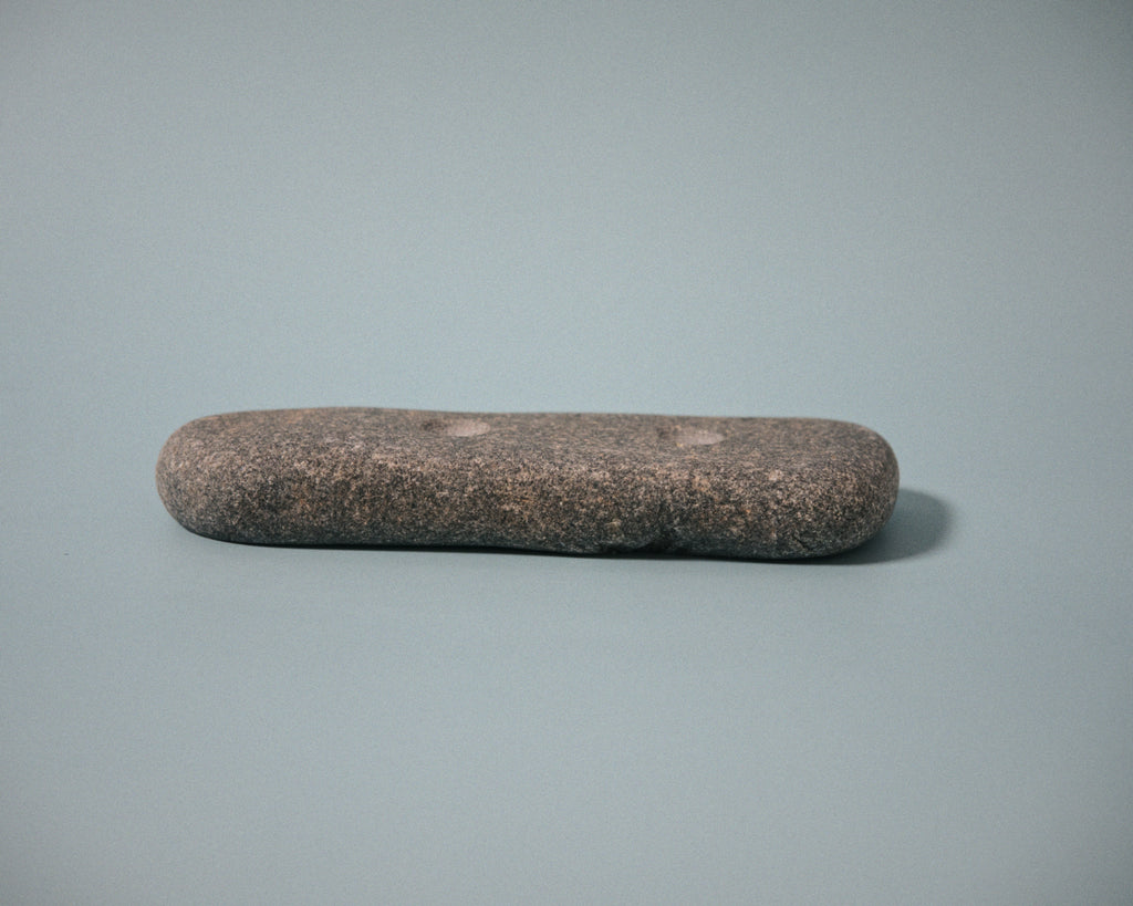 Medium pinch climbing hold made from a natural coastal stone (STO061)