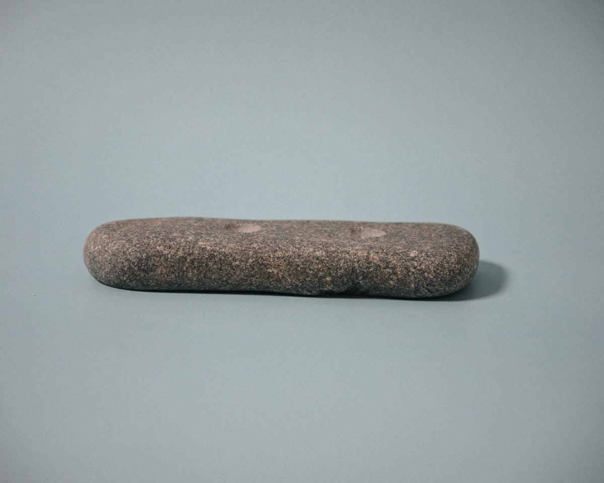 Medium pinch climbing hold made from a natural coastal stone (STO061)