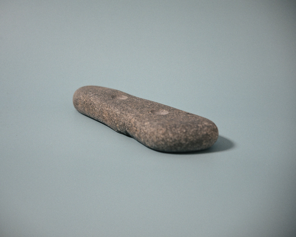 Medium pinch climbing hold made from a natural coastal stone (STO061)
